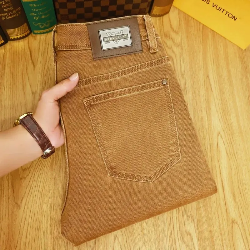 Autumn fashion light luxury men's jeans khaki small feet elastic coffee casual pants — image 1