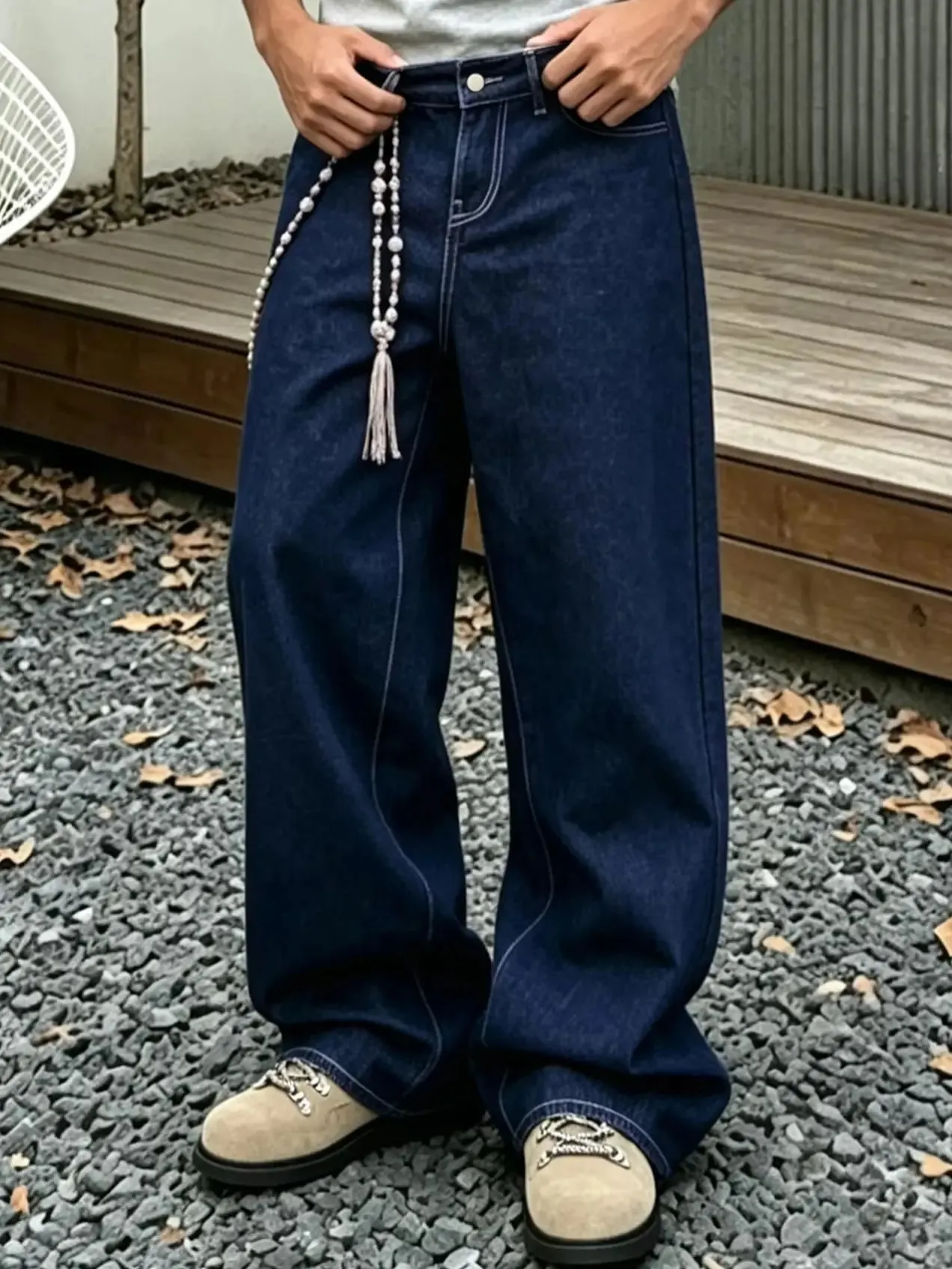 Denim Blue Dark Topstitched Wide-Leg Jeans Are the Same for Men and Women. They Are High-Waisted Loose and Floor-Length. They A