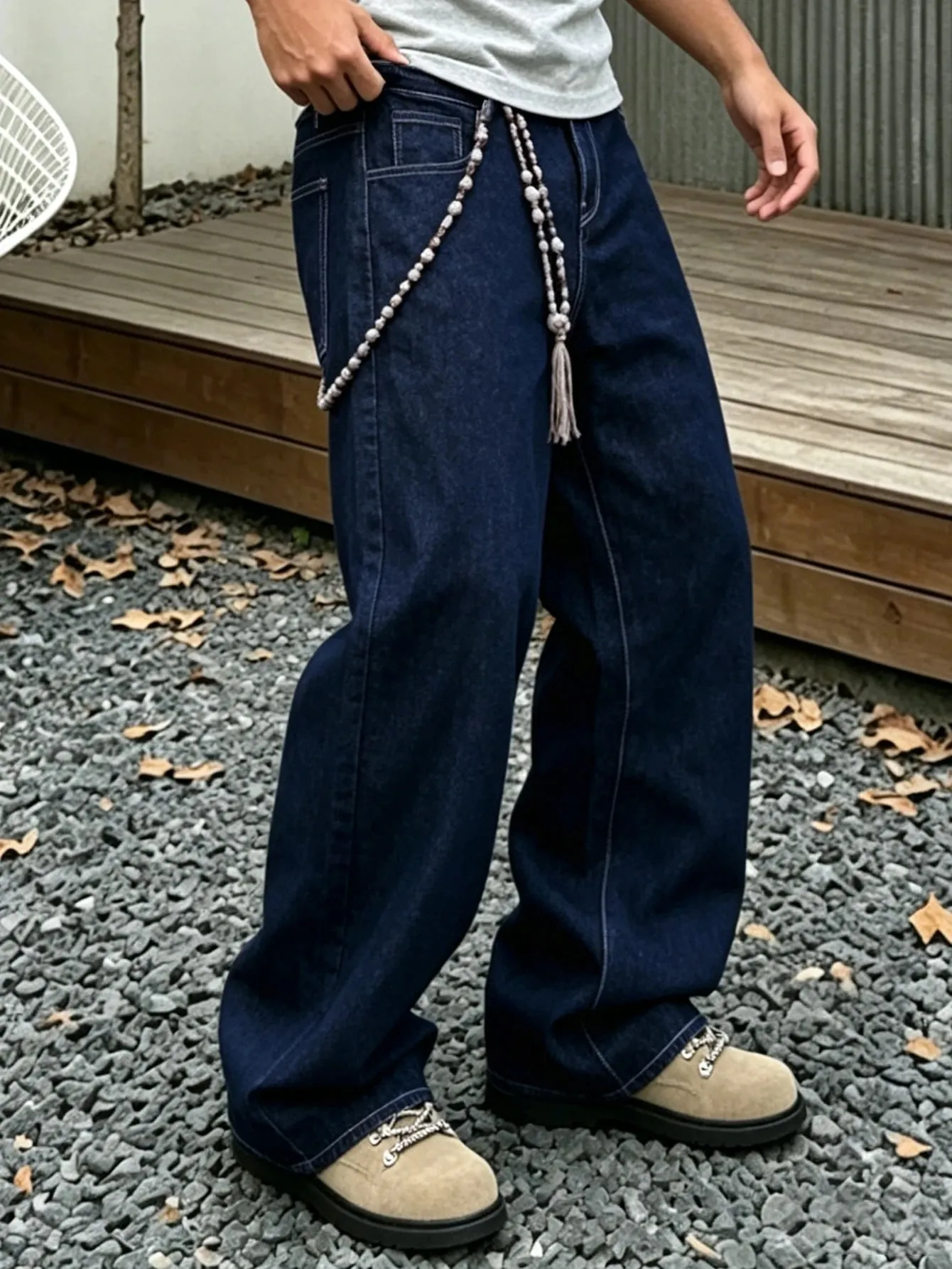 Denim Blue Dark Topstitched Wide-Leg Jeans Are the Same for Men and Women. They Are High-Waisted Loose and Floor-Length. They A