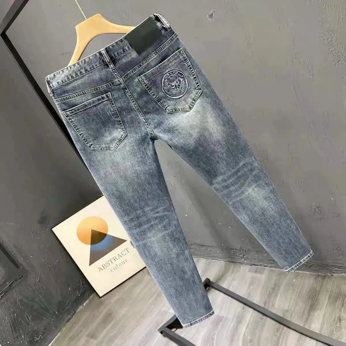 Korean Climate Lot Pants Light Luxury Trendy Brand Embossed Blue Jeans Men's Handsome Slim-fit Small Feet Elastic Trousers New — image 8