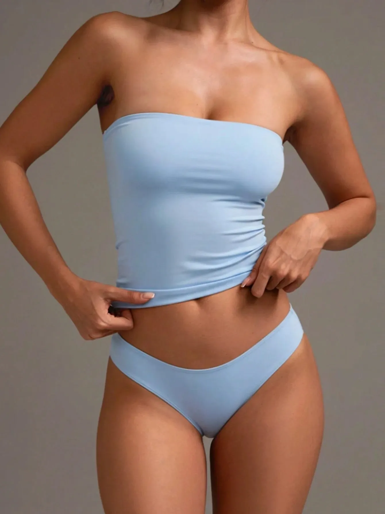 A sexy Basic Strapless Camisole—A Stylish Solid-Color Stretchy and Form-Fitting Light Blue Tube Top. Suitable for All Season