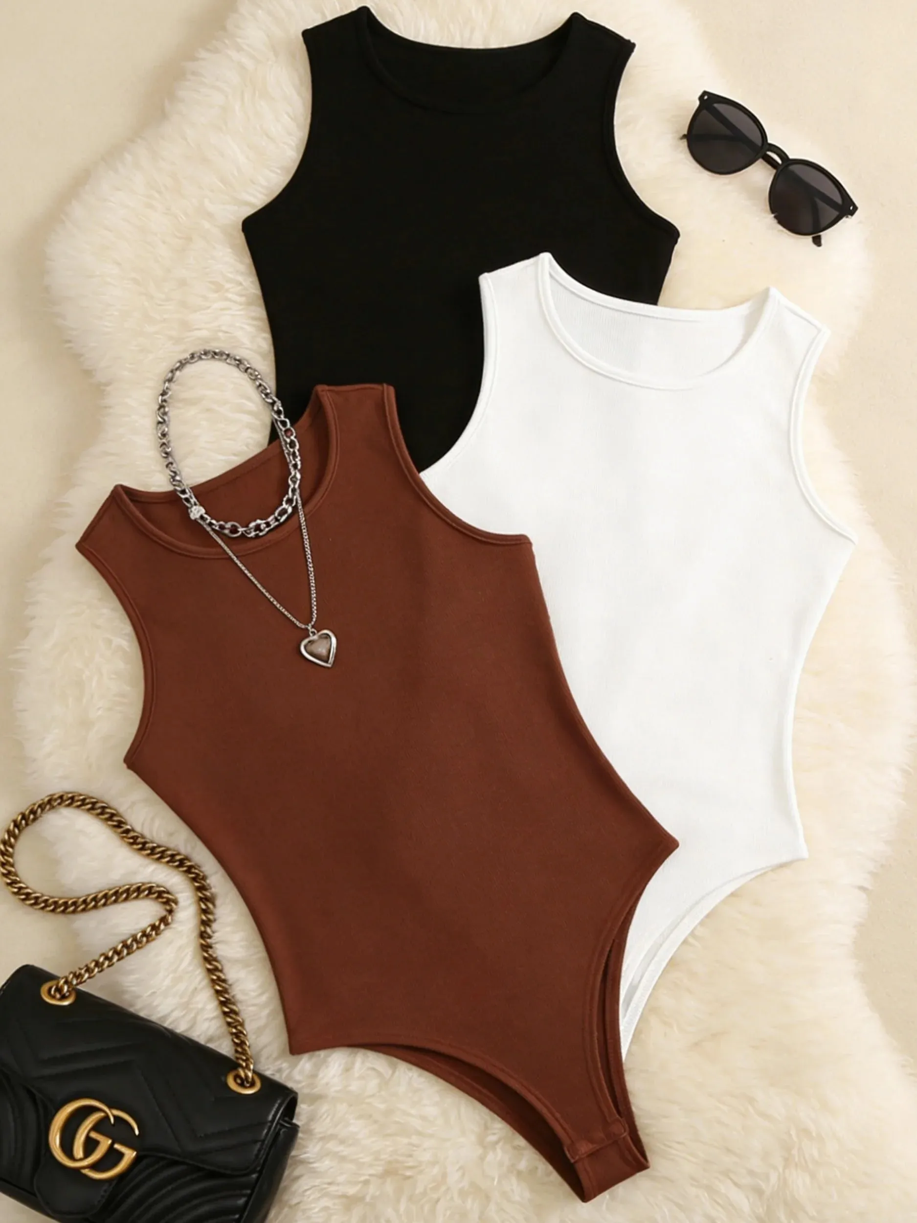 Women 3 Pack Solid Ribbed Round Neck Bodysuit Casual Sleeveless Form Fitting One Piece Bodysuit Set — image 2